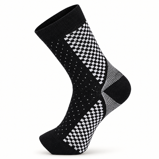 Black sock with a white knitted geometric pattern.