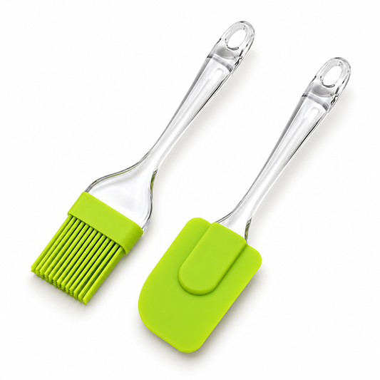Green silicone spatula and silicone pastry brush with clear handles.