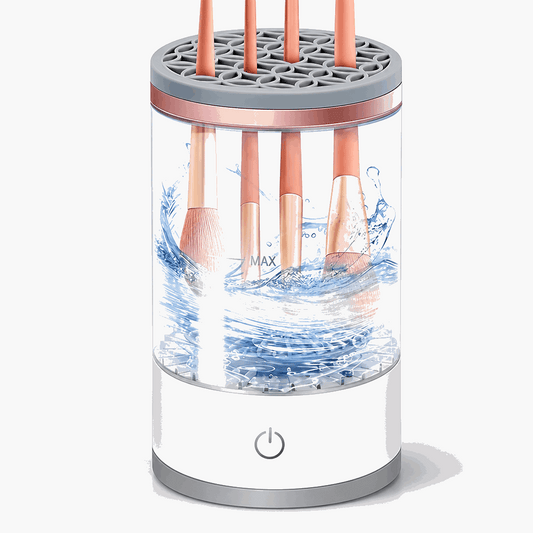 Electric makeup brush cleaner with transparent container, brush holder top, power button and MAX fill mark.